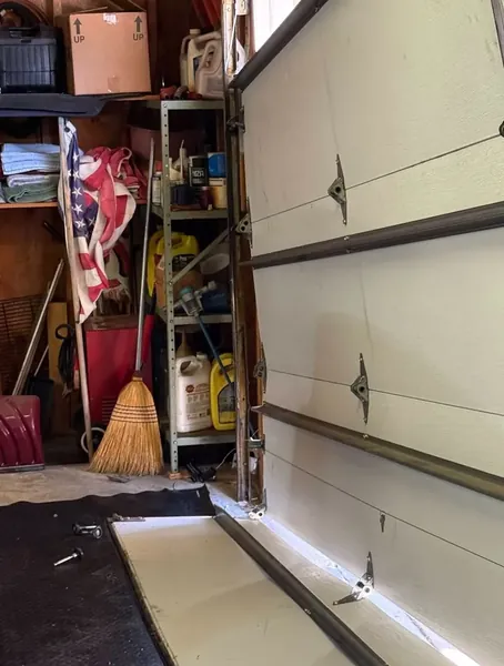 Garage door off track repair St. Louis Missouri